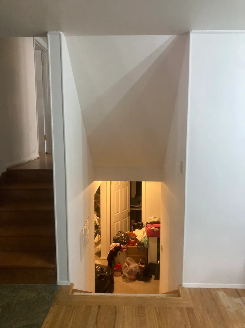 Stairwell with a new built-out box beside the landing